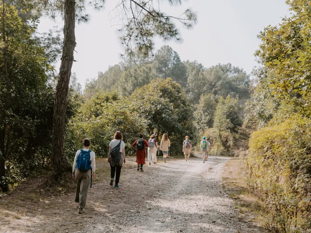 Yogi Rajan guiding a yoga trekking experience near Nagarkot, Nepal