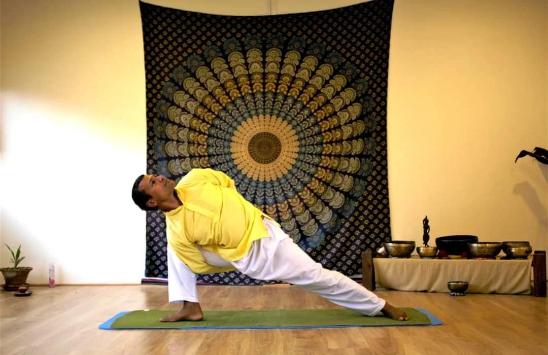 Yogi Rajan Bastola practicing yoga at Niru Yoga Homestay in Nepal