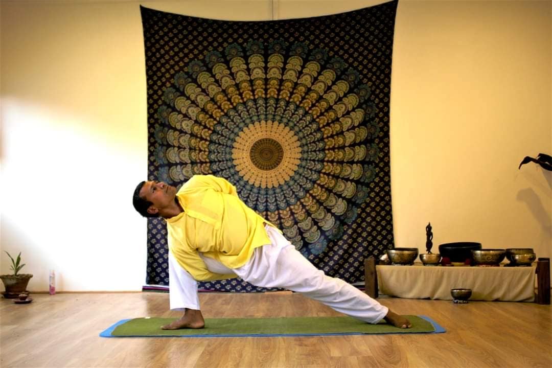 Yogi Rajan Bastola practicing yoga at Niru Yoga Homestay in Nepal
