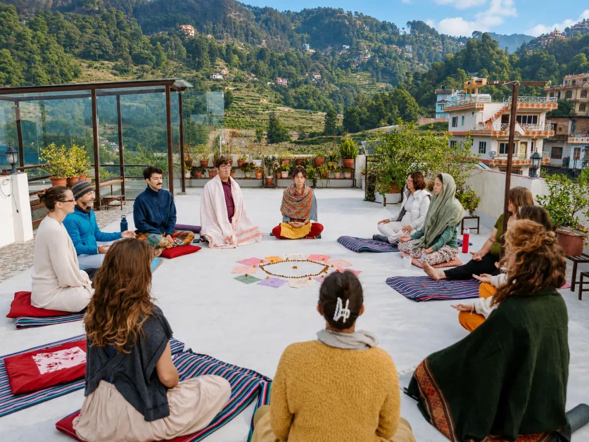 International guests enjoying a guided rooftop class at Niru Yoga Homestay
