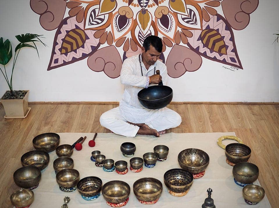 Sound healing and meditation session at yoga retreat in Nepal
